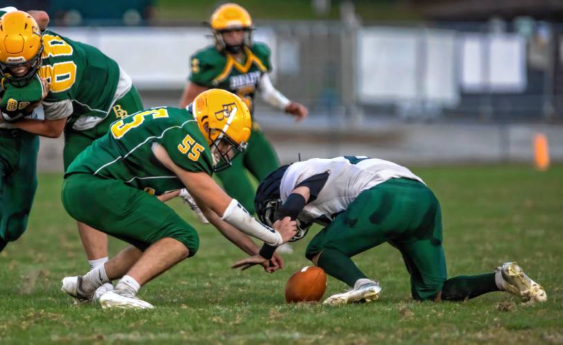 Bishop Brady linebacker Luke Jackson gets ready to pounce on a fumble by Newfound running back Ryan Hennessey during the second quarter at Memorial Field on Saturday night. Brady scored after the fumble recovery by Jackson and forced four turnovers.