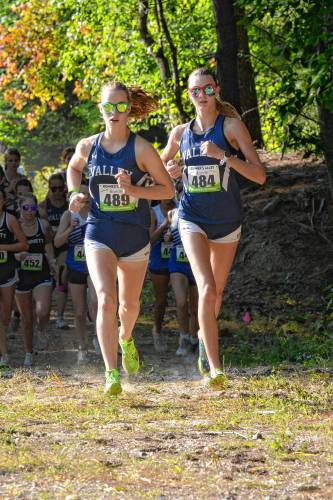 Merrimack Valley’s Lily Moser (489) and Madison Geddes (484) lead the pack at the Kingswood Invitational on Monday. Moser won the 5K in 21:21, while Geddes finished second in 21:57 to lead MV to the victory. Merrimack Valley’s Lily Moser (489) and Madison Geddes (484) lead the pack at the Kingswood Invitational on Monday. Moser won the 5K in 21:21, while Geddes finished second in 21:57 to lead MV to the victory.