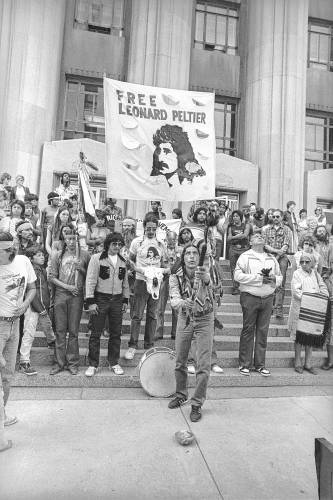 Native Americans from several states gather in front of the Federal Courts Building in St. Louis during a rally in support of Leonard Peltier, Sept. 12, 1985. 