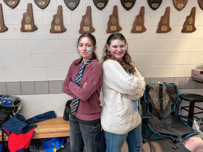 Sophomores Lily Rayne and Brigid Kelly with the Argentina flag painted on their faces at the World Fair at Bow High School on Friday