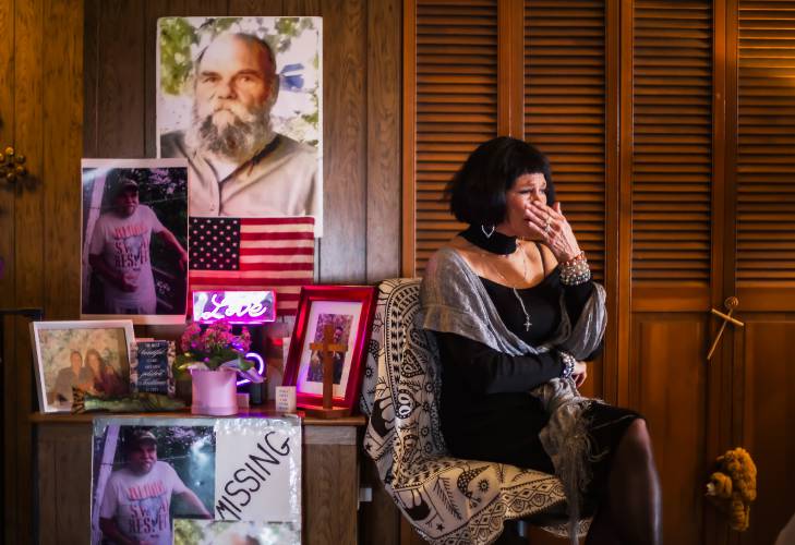 Deborah Eckland breaks down while talking about the trauma of finding her unhoused brother, Glenn Chrzan,  who was found dead in Manchester this past winter. Eckland built a memorial along with his ashes at her apartment in Concord.
