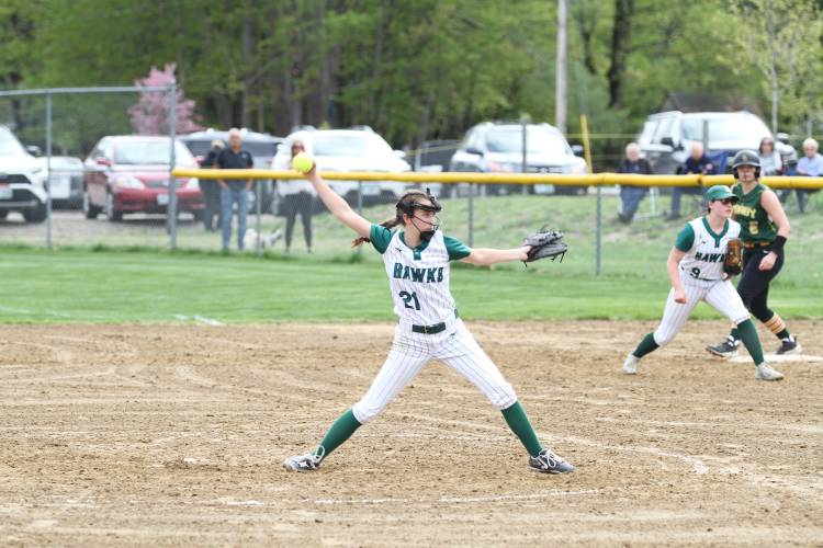 Hopkinton's pitcher, Ella-Mai Johnson, winds up and prepares to launch against the Bishop Brady Giants in a hard fought game.

