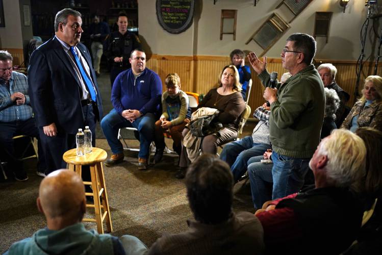 Republican presidential candidate former New Jersey Gov. Chris Christie listens to a question at a town hall campaign event at Mitchell Hill BBQ Grill and Brew, Tuesday, Jan. 9, 2024, in Rochester, N.H. (AP Photo/Robert F. Bukaty)