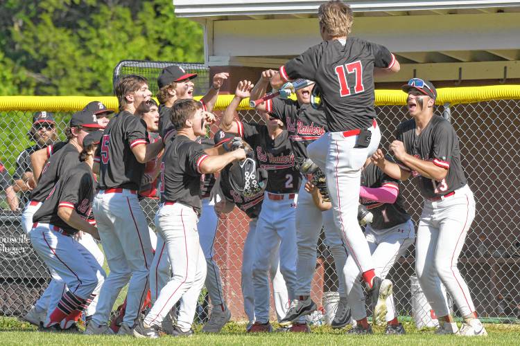 Belmont’s Anakin Underhill (17) celebrates with his teammates after hitting a home run in the fourth inning on Saturday, June 1, 2024. Underhill also pitched a complete game to earn the victory.