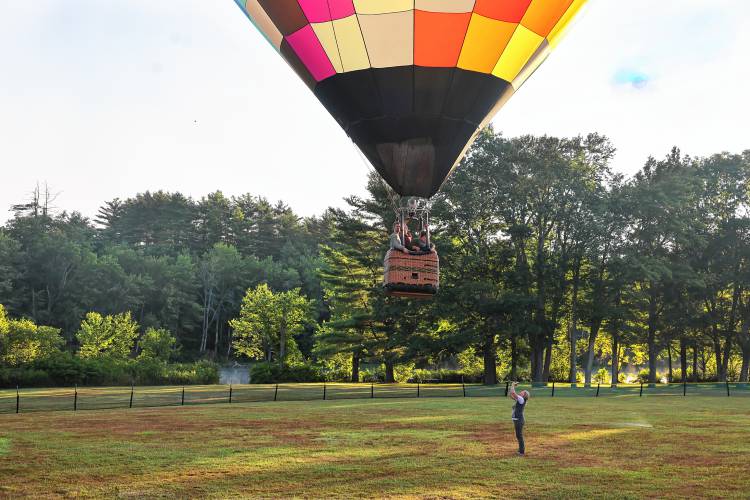 Hot air balloons take off from Drake Field in Pittsfield.