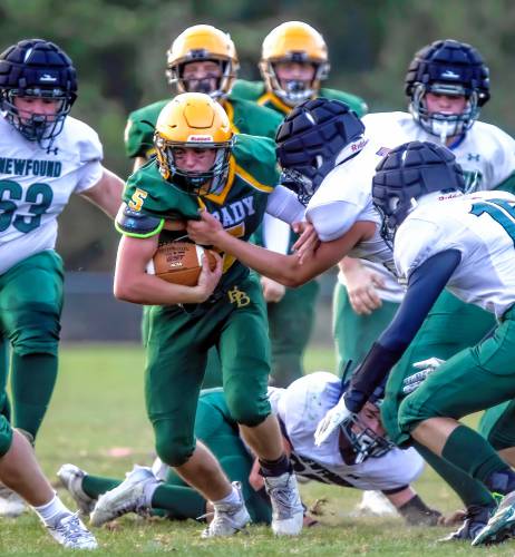 Bishop Brady quarterback Joey Richardson runs through the line against Newfound at Memorial Field in Concord on Saturday evening.