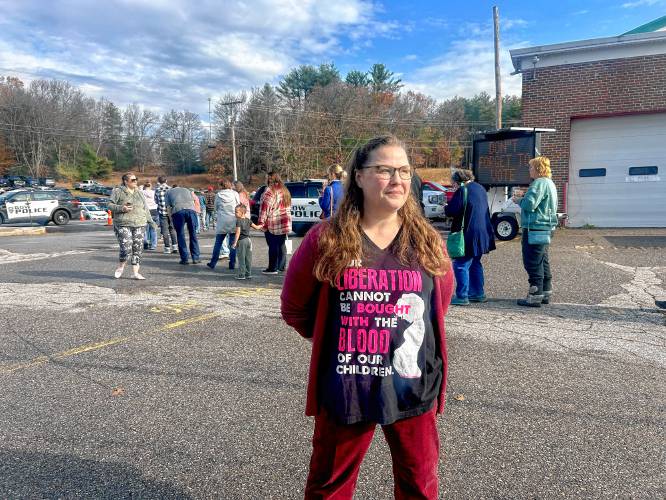Joi Cozzi, 50, outside the Bow Community Center Tuesday morning.
