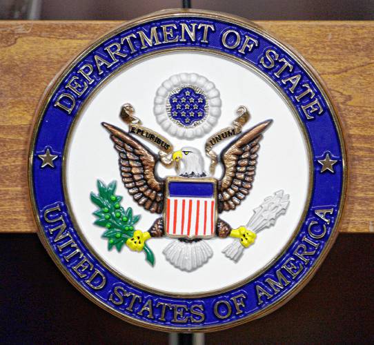 FILE - This Jan. 25, 2010, file photo, shows the United States Department of State seal on a podium at the State Department in Washington. In a new travel warning for Lebanon issued early Friday, Sept. 6, 2013, the State Department said it had instructed nonessential staffers to leave Beirut and urged private American citizens to depart Lebanon due to security concerns as the Obama administration and Congress debate military strikes on neighboring Syria. (AP Photo/Alex Brandon, File) FILE - This Jan. 25, 2010, file photo, shows the United States Department of State seal on a podium at the State Department in Washington. In a new travel warning for Lebanon issued early Friday, Sept. 6, 2013, the State Department said it had instructed nonessential staffers to leave Beirut and urged private American citizens to depart Lebanon due to security concerns as the Obama administration and Congress debate military strikes on neighboring Syria. (AP Photo/Alex Brandon, File)