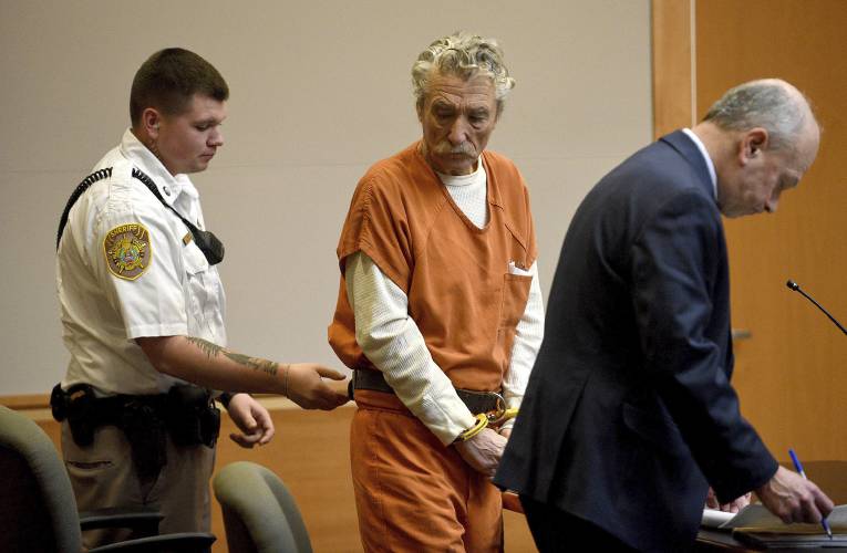 Bradley Asbury, 70, gets remanded after getting the maximum sentence at Hillsborough County Superior Court in Manchester, N.H., Monday, Jan. 27, 2025. (David Lane/Union Leader via AP, Pool)