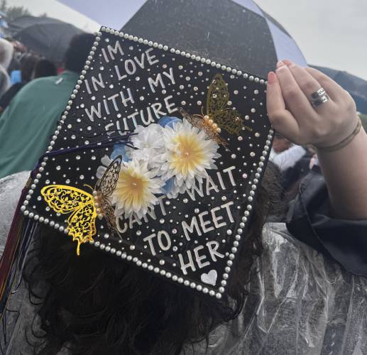 Jacqueline Pearl holds her cap at the Merrimack Valley High School graduation on Saturday.