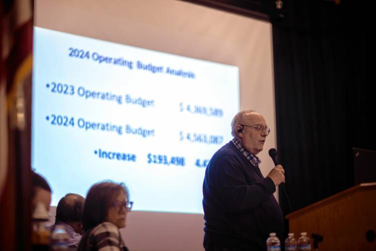 Warner budget committee chair Michael Cutting speaks to residents about the increase in the town budget on Wednesday night, March 13, 2023.