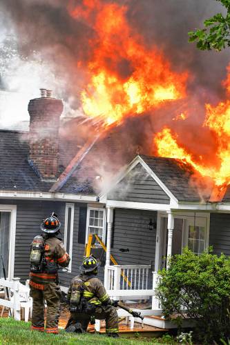 Concord City Firefighters were dispatched to a house fire at 286 Elm Street in Penacook at 1:32 pm. Heavy fire was showing from the large house on arrival and a Second Alarm was dispatched bringing numerous outside communities to assist with Tanker trucks for lack of water due to no fire hydrants in the area and to also rotate crews because of the extreme heat & humidity. The fire brought under control at 2:44 pm