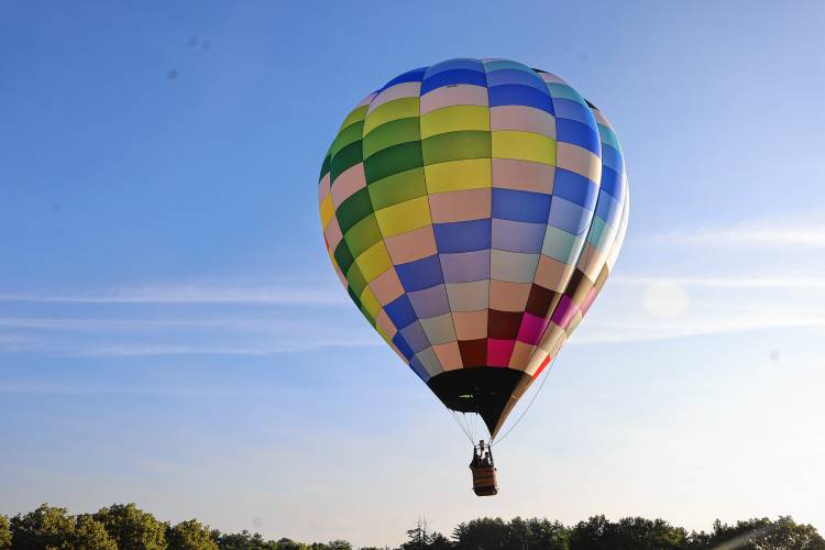Balloons float through the sky last Saturday.