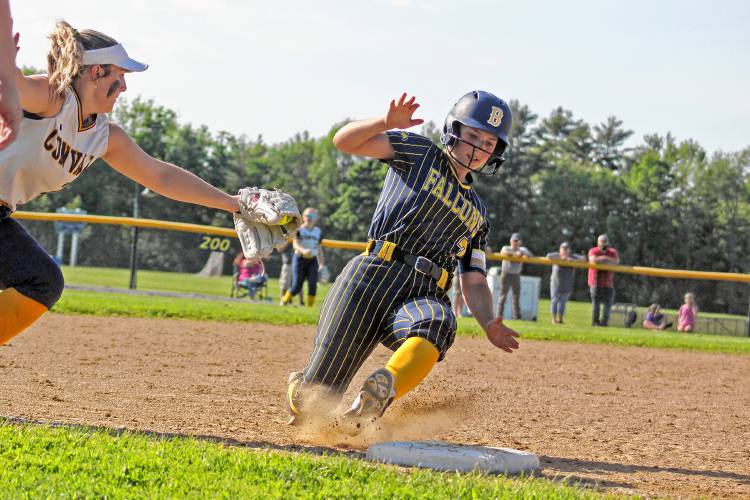 Bow's Lily Wright (right) just beats out a ConVal tag at third base during Saturday's Division II softball quarterfinal. Bow came from behind to win, 3-2.