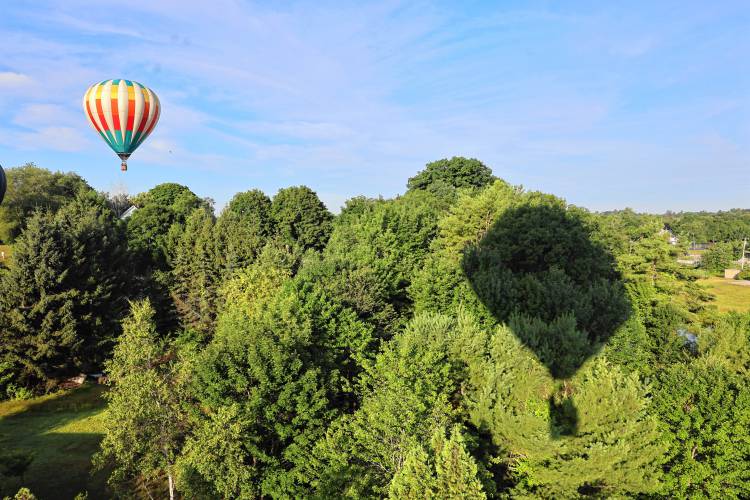 Balloons float through the sky last Saturday.