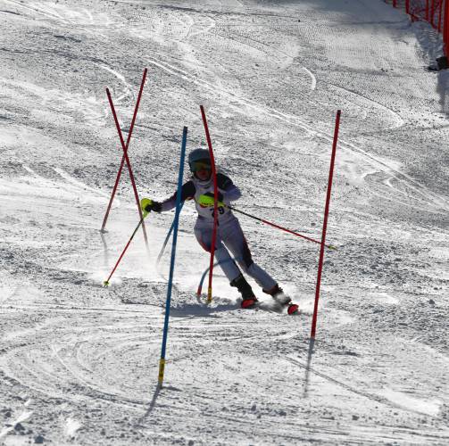 Concord junior Mika Taylor competes in the slalom at the NHIAA Division I Alpine ski championships on Monday at Pats Pea. Taylor won the morning giant slalom and had the fastest slalom run in the afternoon, but missed a gate on her second slalom race.