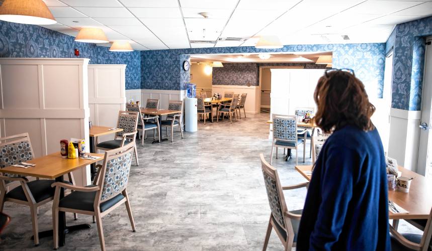 Merrimack County Nursing Home administrator Heather Moquin shows the renovated dining room of the McLeod Building at the Merrimack County Nursing Home on Monday.