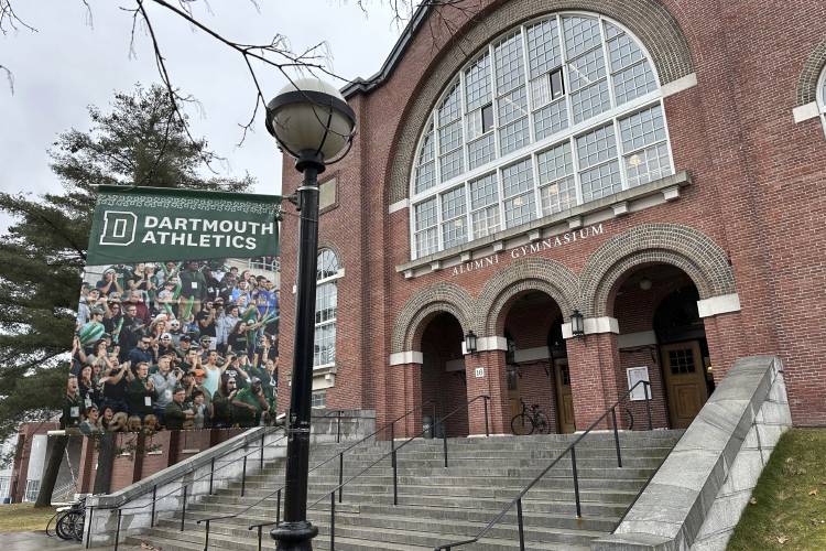 A Dartmouth Athletics banner hangs outside Alumni Gymnasium on the Dartmouth University campus in Hanover on March 5.