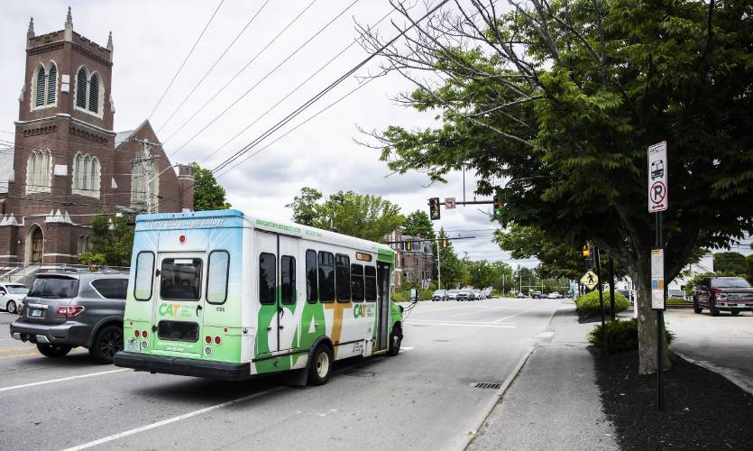 A Concord city bus drives past the stop on North Main Street in Concord in June. A Concord city bus drives past the stop on North Main Street in Concord in June.