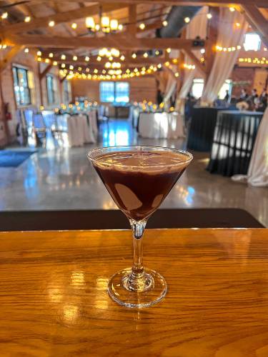 The Barn at Bull Meadow serves espresso martinis at wedding receptions.