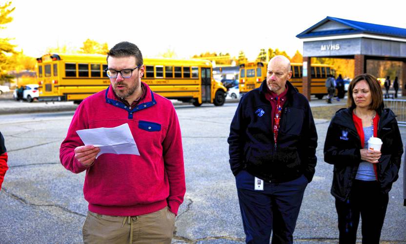 Merrimack Valley High School history teacher Rob Montgomery speaks to a group of teachers outside the school on Wednesday morning as the school buses arrived and school was about to begin.