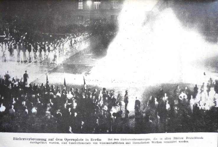 Photo from the Nazi book burning at Bebelsplatz (Opernplatz), Berlin on May 10, 1933, orchestrated by the Nazi party and the German Student Union as part of their propaganda campaign “Action against un-German spirit.” Photo from the Nazi book burning at Bebelsplatz (Opernplatz), Berlin on May 10, 1933, orchestrated by the Nazi party and the German Student Union as part of their propaganda campaign “Action against un-German spirit.”