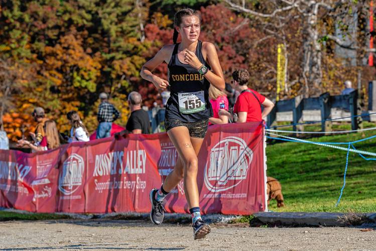 Concord’s Shelly Smith heads towards the finish line at the NHIAA Division I cross country championship on Saturday. Smith finished in 17th place to lead the Crimson Tide to fifth place as a team, earning a spot at next weekend’s Meet of Champions.