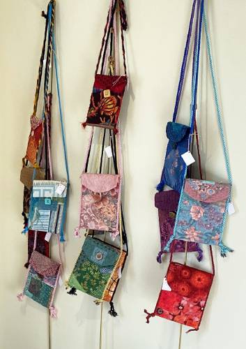 Fabric purses created and embellished by Anne Boedecker.