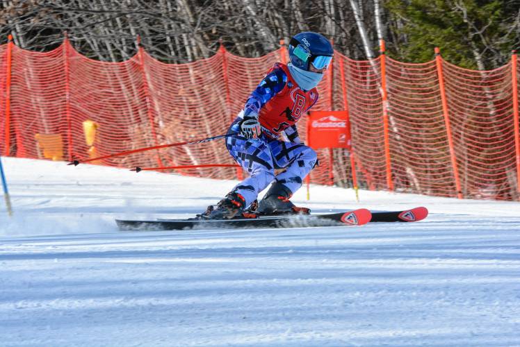 Belmont’s Ella Stevens competes in the giant slalom at the NHIAA Division III Alpine ski championships at Gunstock on Feb. 14. Stevens, a freshman, was crowned the individual champion in both the giant slalom and slalom.
