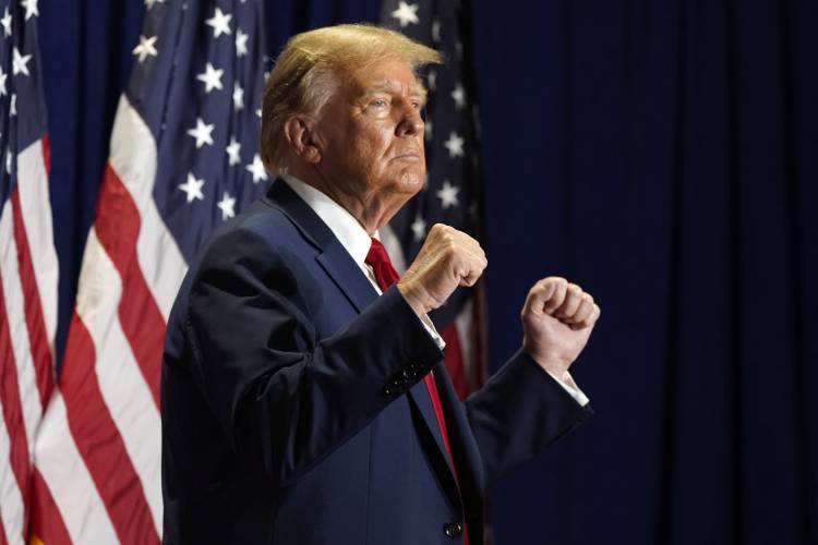 FILE - Republican presidential candidate former President Donald Trump gestures at a campaign rally, March 2, 2024, in Richmond, Va. The Supreme Court has restored Donald Trump to 2024 presidential primary ballots, rejecting state attempts to hold the Republican former president accountable for the Capitol riot. The justices ruled a day before the Super Tuesday primaries that states cannot invoke a post-Civil War constitutional provision to keep presidential candidates from...