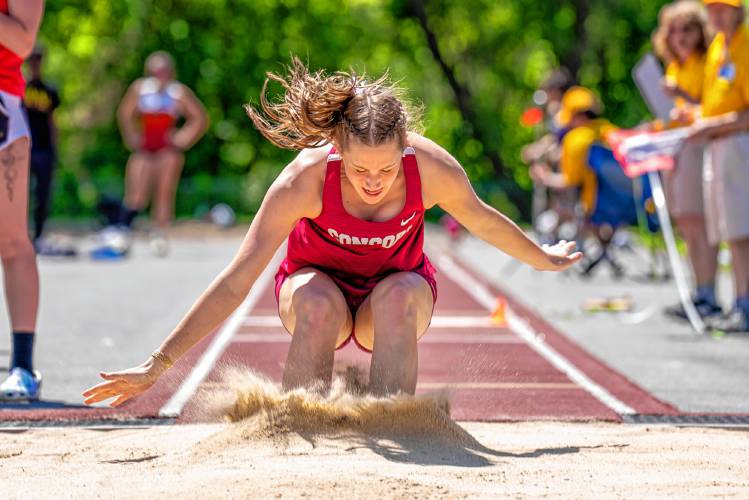 Concord’s Ella Goulas competes in the triple jump at the NHIAA Division I track and field championships at Portsmouth High School on Saturday, May 25, 2024. Goulas won the triple jump title with a leap of 36 feet, 11.5 inches, and also finished third in the high jump and long jump to lead the Concord girls to third as a team.