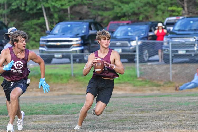 Concord quarterback Colby Nyhan looks downfield during a seven-on-seven scrimmage against Manchester West last month at Rundlett Middle School.