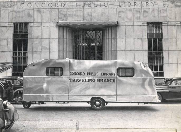 The Concord Bookmobile is pictured in front of the Concord Public Library in 1949. The Concord Bookmobile is pictured in front of the Concord Public Library in 1949.