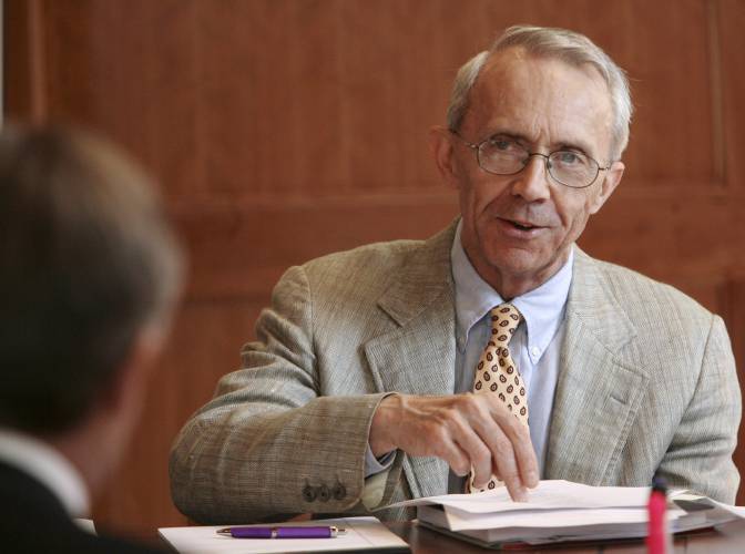 LEFT: Retired Supreme Court Justice David Souter works with his group to promote civics education in New Hampshire schools during a meeting in Concord.
