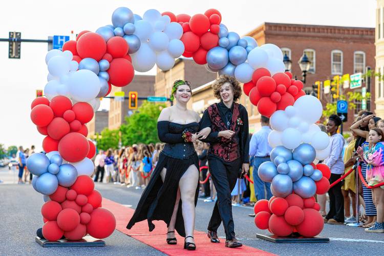 Emma Everett and Elliott Case arrive at the Concord High prom Thursday night at the Bank of NH Stage.