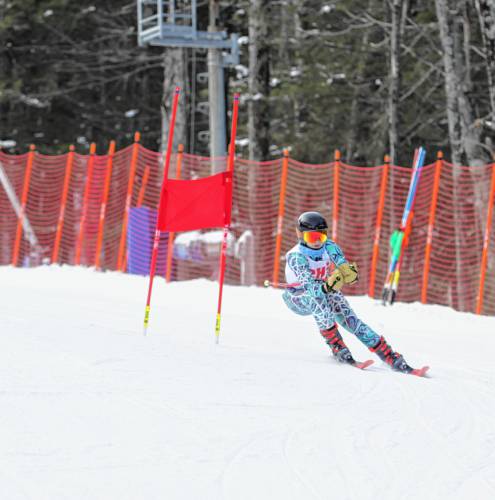 Senior Lilly Merrill competes at the Division I girls’ Alpine skiing championship on Monday at Pats Peak. Merrill finished 16th in the slalom and 24th in the giant slalom to score for the Tide.