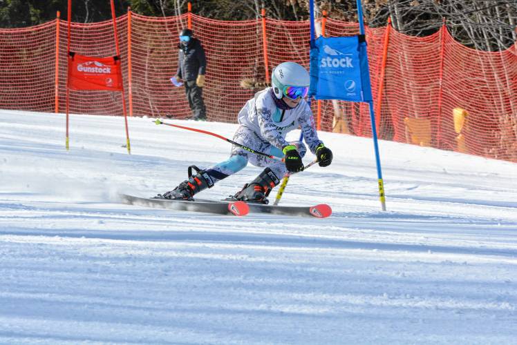Hopkinton’s Marcella Guadagno competes in the giant slalom at the NHIAA Division III Alpine ski championships at Gunstock on Wednesday. Guadagno finished second in both the GS and slalom to help the Hawks successfully defend their team title.