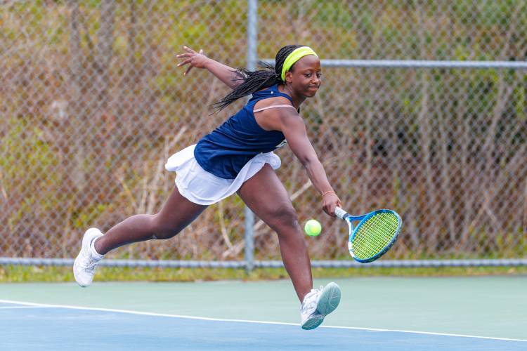 Bow’s Grace Modzeleski reaches to return a shot against Souhegan during a home match last May. The Falcons’ girls and boys tennis teams both boast experience rosters and high hopes for the coming tennis season.