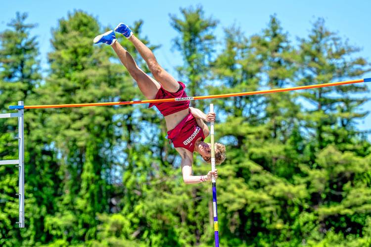 Concord’s Colby Nyhan goes over the bar in the pole vault at the NHIAA Division I track and field championships at Portsmouth High School on Saturday. Nyhan cleared 14-6 to lead the Concord boys to fourth as a team.
