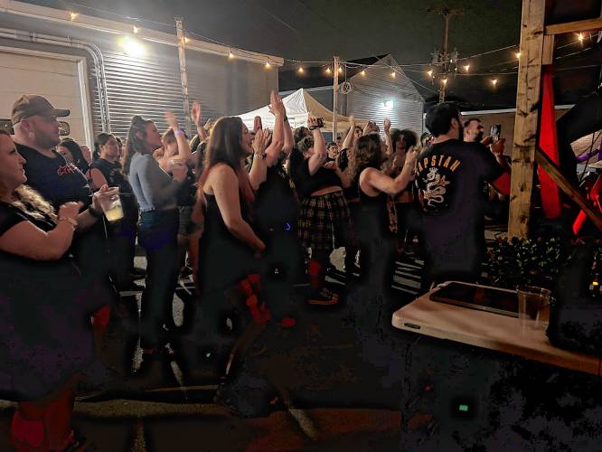 A crowd of more than 100 people showed up to rock out at the “Summertime Sadness” emo night put on by Concord resident Starsea Deoss.
