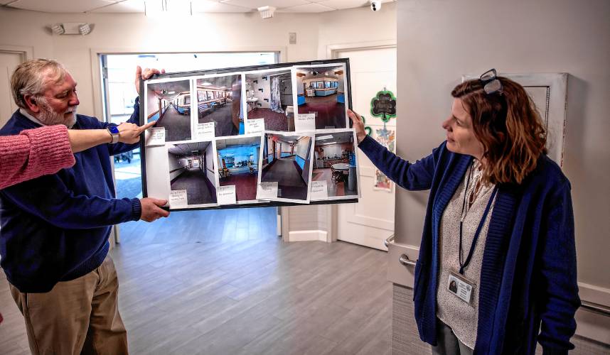 Merrimack County Nursing Home administrator Heather Moquin and  County Commissioner Stephen Shurtleff hold up a collection of photos of the old unit while standing in the renovated unit of the McLeod Building at the Merrimack County Nursing Home on Monday.