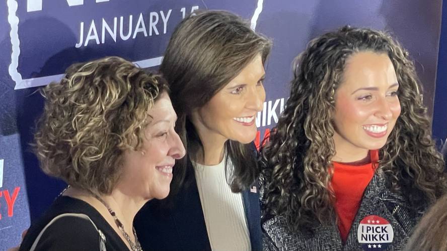 Nikki Haley takes a photo with voters in Ankeny, Iowa.