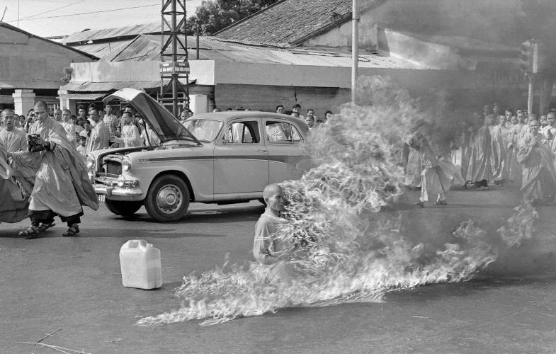 In this June 11, 1963, file photo, Thich Quang Duc, a Buddhist monk, sets himself on fire and burns to death at a highway intersection in Saigon, Vietnam.