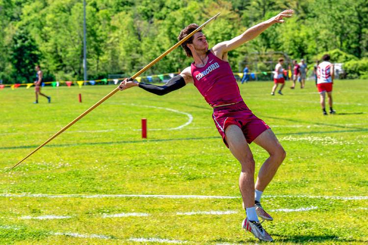 Concord’s Nick Reynolds throws the javelin at the NHIAA Division I championship at Portsmouth High School on Saturday. Reynolds’ best throw of 205-10 set a new Division I record.