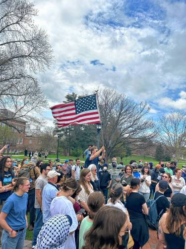 Protesters at the University of New Hampshire demanded on Monday that university Police Chief Paul Dean resign following what they claim was an assault on a student at a protest last week.