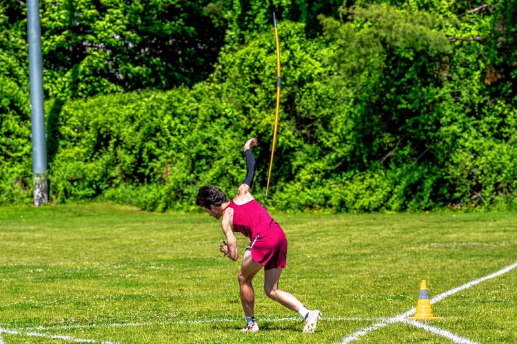 Concord’s Nick Reynolds uncorks a javelin throw at Saturday’s D-I meet. Reynolds set a record with a toss of 205 feet, 10 inches.