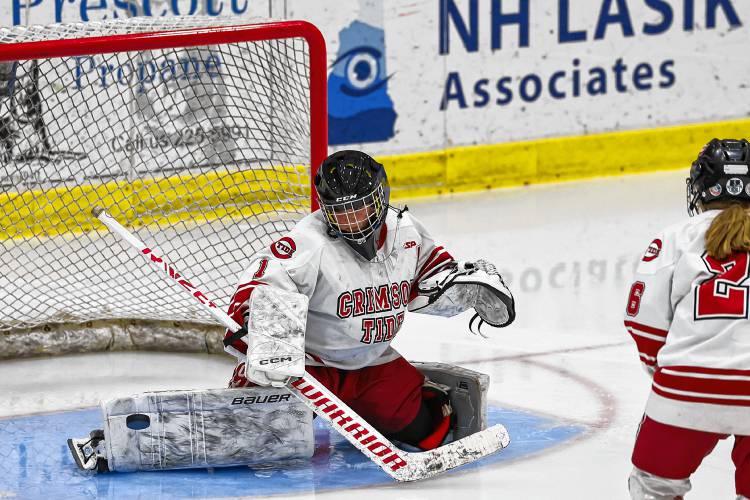 Senior goalie Kaylee DelloIacono makes one of her numerous saves against Hanover in Concord’s semifinal loss on Tuesday night at Everett Arena.