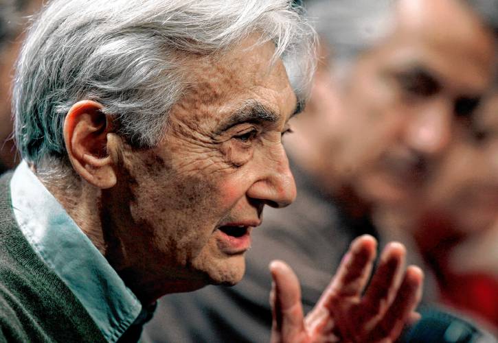 Author Howard Zinn takes part in a panel discussion about a mini-series entitled “The People Speak” at Emerson College in Boston in 2008.