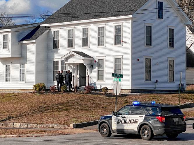 Concord police could be seen outside the multi-unit housing at 120 Pleasant St. Monday.