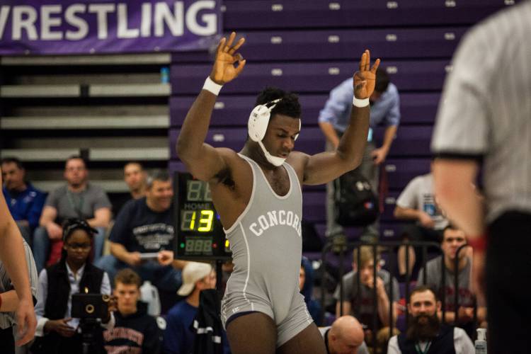 Concord's George Tarwo celebrates his first place win at 182-pounds during Saturday's Meet of Champions at Nashua South High School, Feb. 25, 2017. (ELIZABETH FRANTZ / Monitor staff)